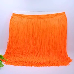 Neonově oranžové nylonové třásně 20 cm